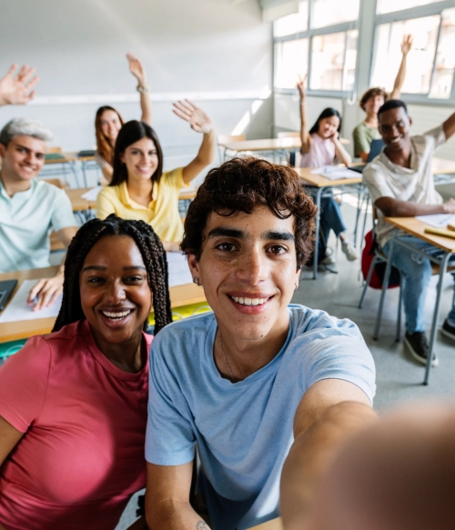 Students taking selfie in classroom