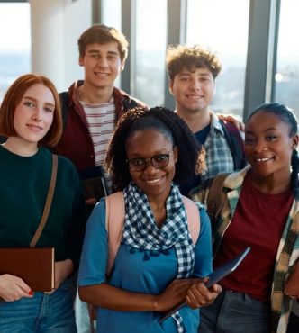 Group of diverse students smiling together